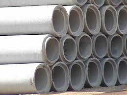 Stack of gray concrete pipes.