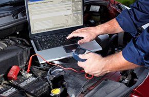 Auto repair with a laptop