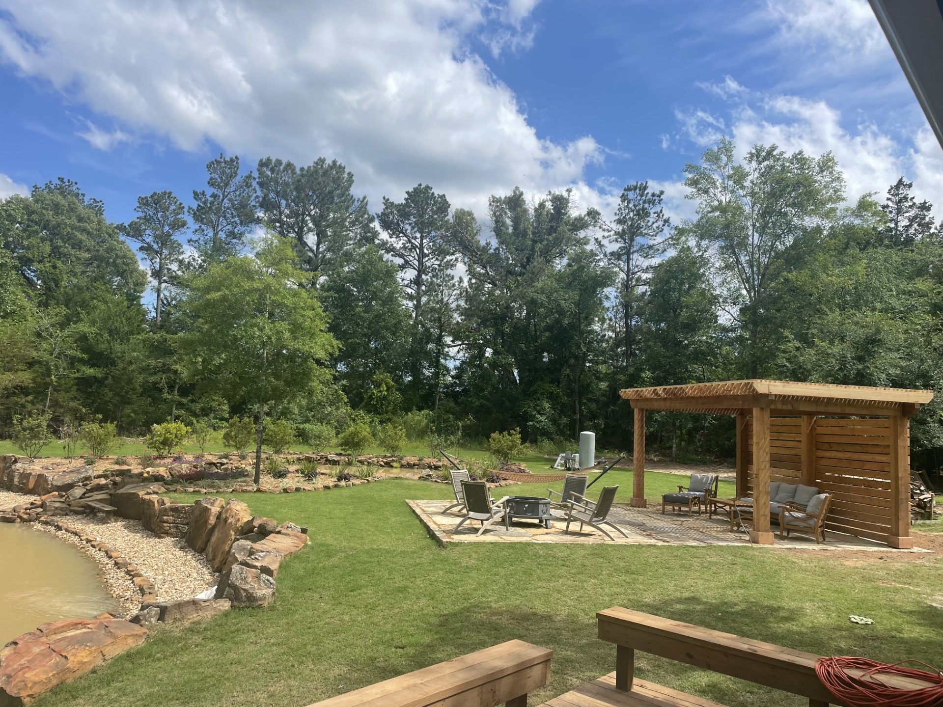  gazebo in the middle of the backyard .