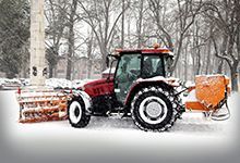 Tractor removing snow
