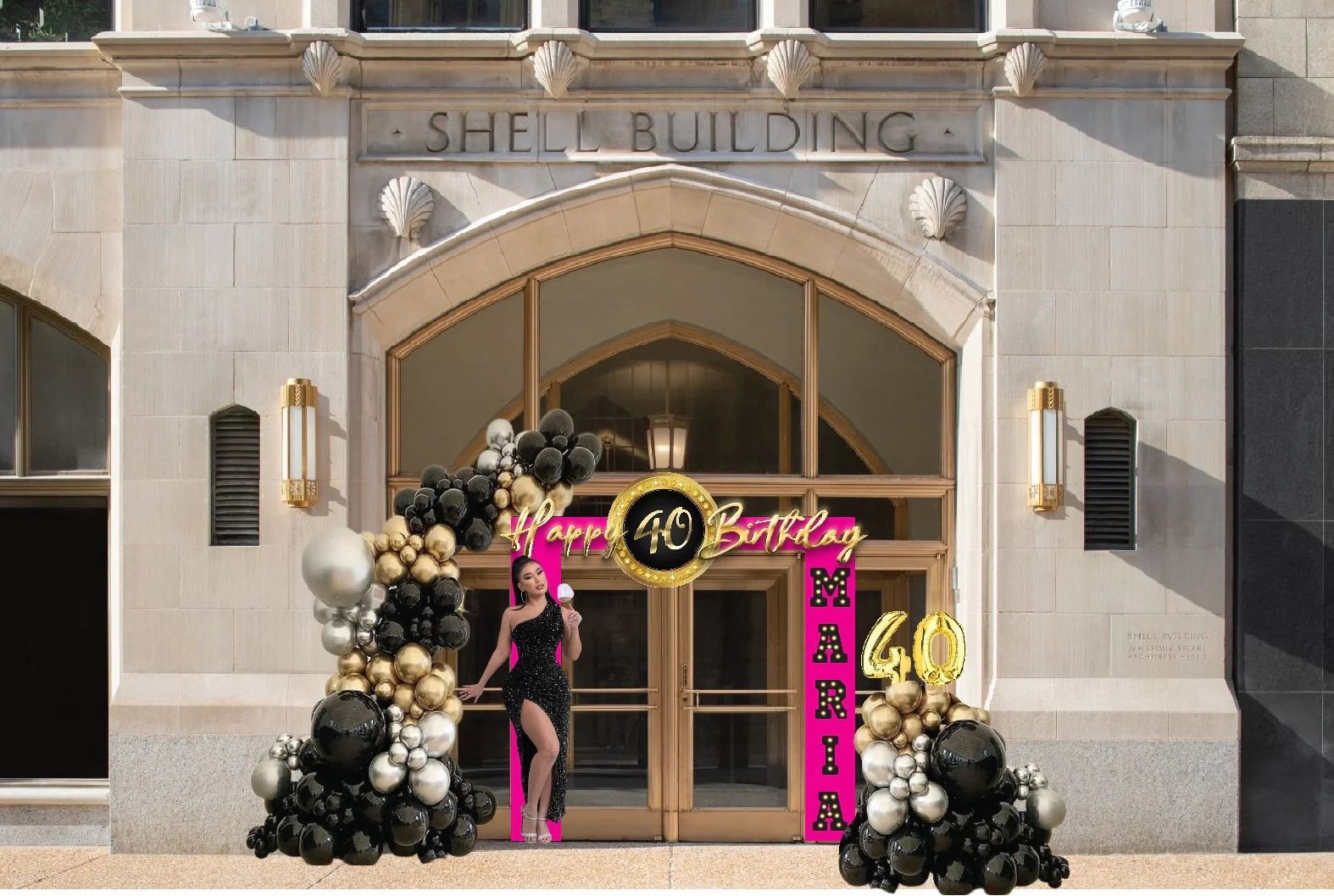 Entrance decorated for a 40th birthday at the Shell Building with balloons and a person holding a microphone.