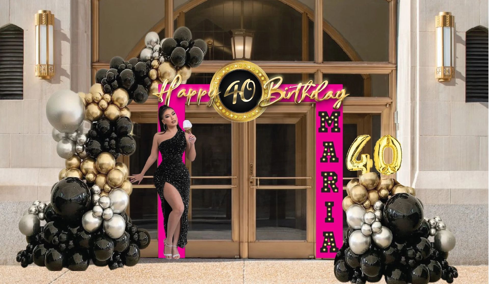 Woman in black dress celebrating her 40th birthday under a balloon arch and banner. Exterior setting.