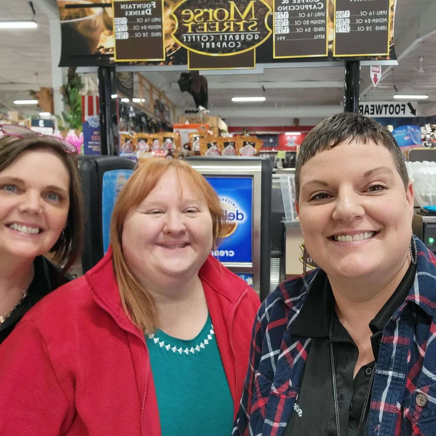 three ladies smiling