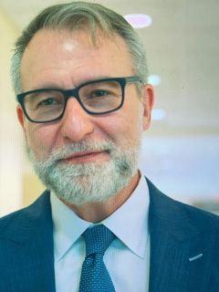 Photo of {{Team Member Name}}