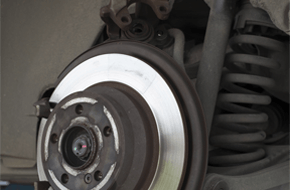 Car disc brake and shock strut