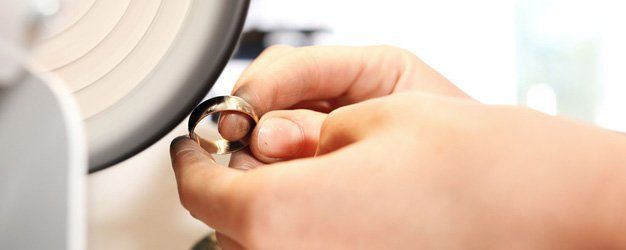 A man repairing a wedding ring