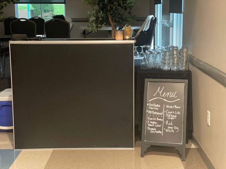 A chalkboard with the word menu written on it