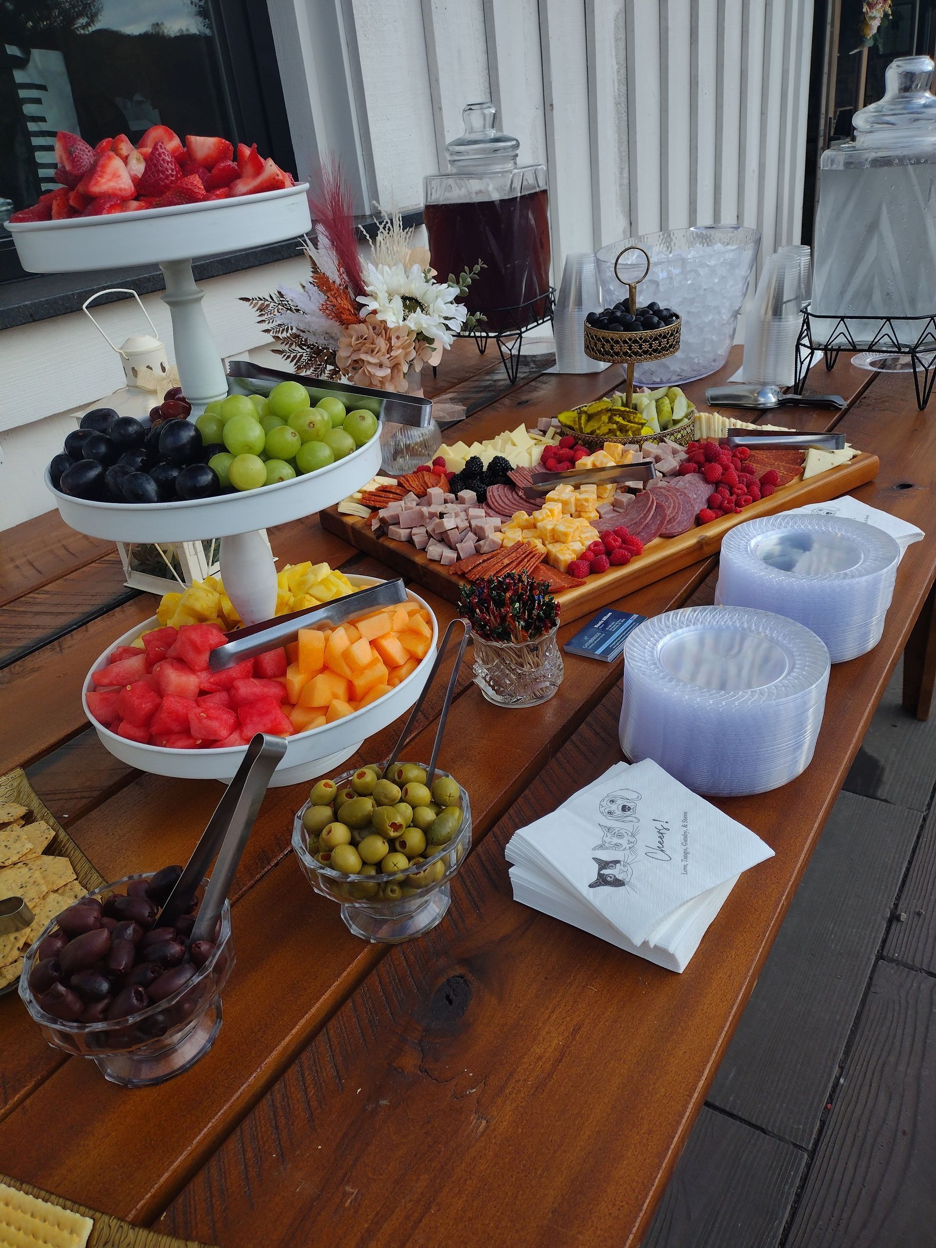 A wooden table topped with a variety of fruits and vegetables.