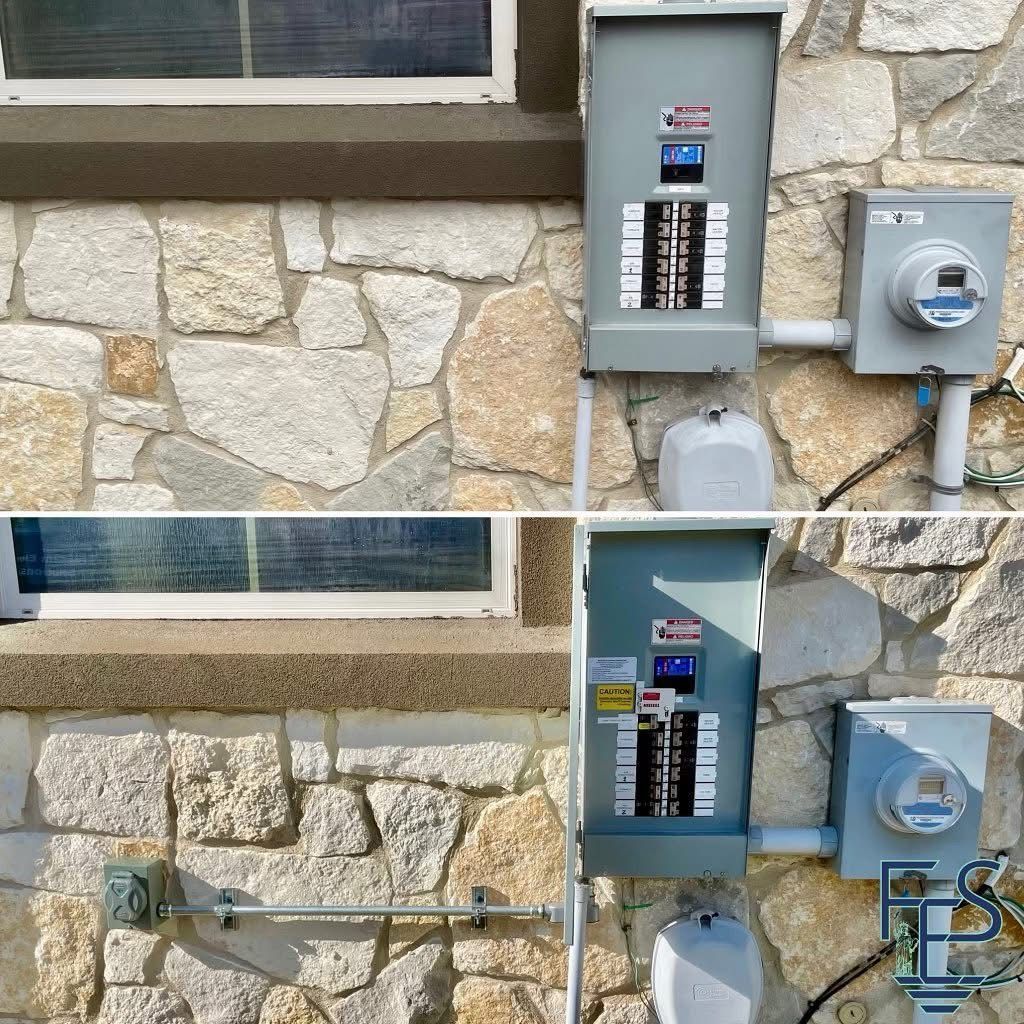 Electrical panel and meter box mounted on a stone wall, near a window.