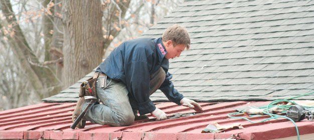 Man installing new roof
