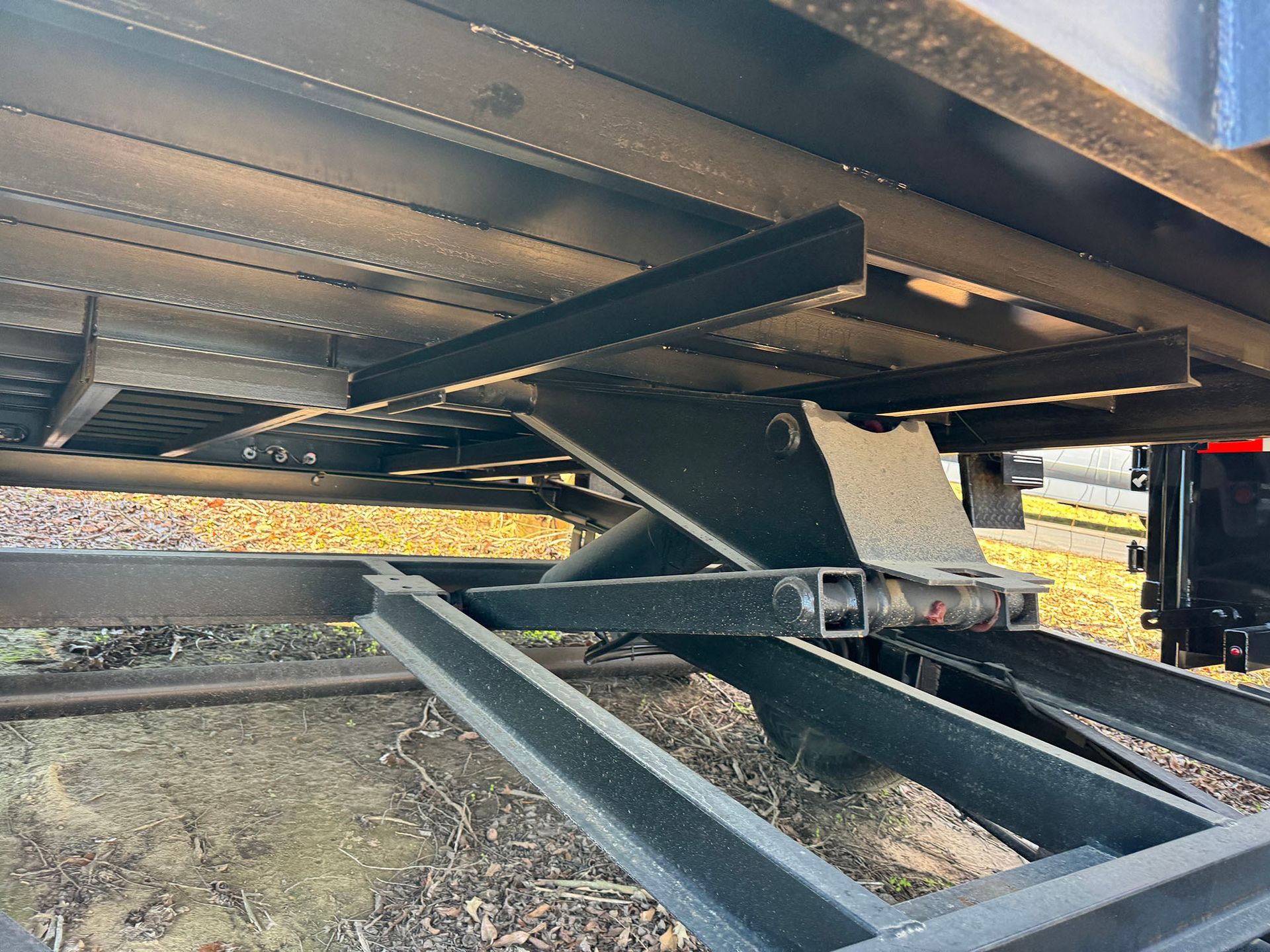 A close up of the underside of a trailer.
