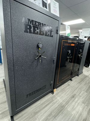 A large, gray gun safe with the words 