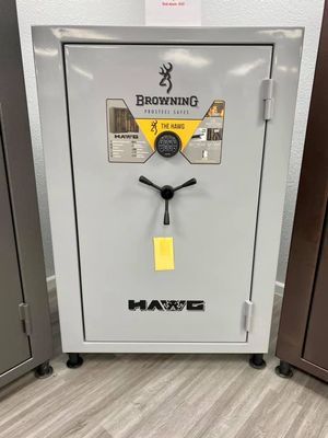 Gray Browning Hawk gun safe with a combination dial and handle.