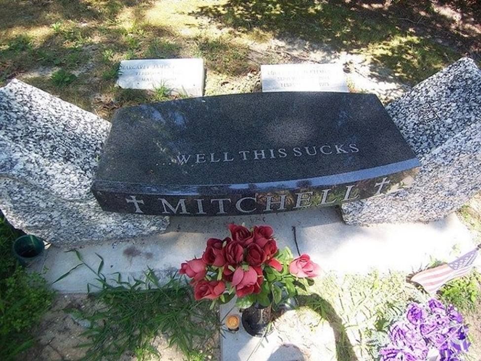 A gravestone in a cemetery