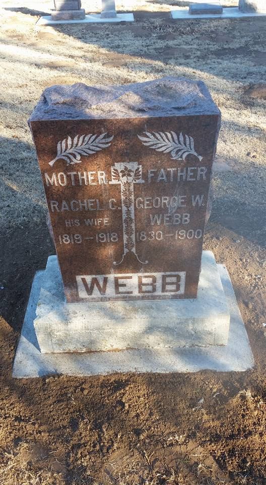 A gravestone for mother and father webb in a cemetery.