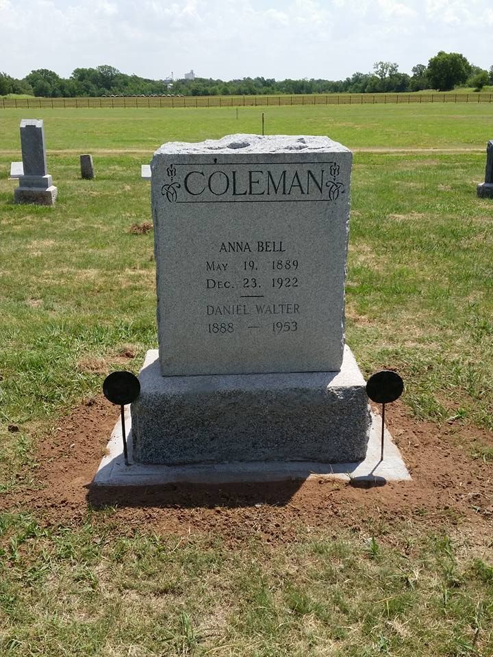 A gravestone in a cemetery with the name coleman on it