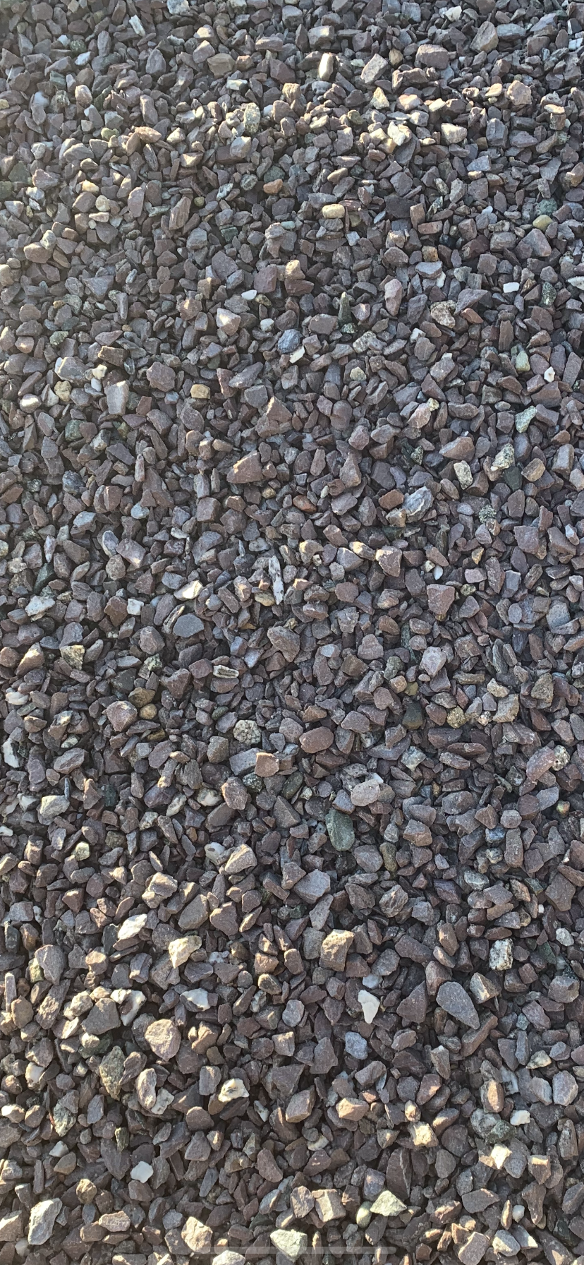 A pile of gravel with the words out of stock written on it