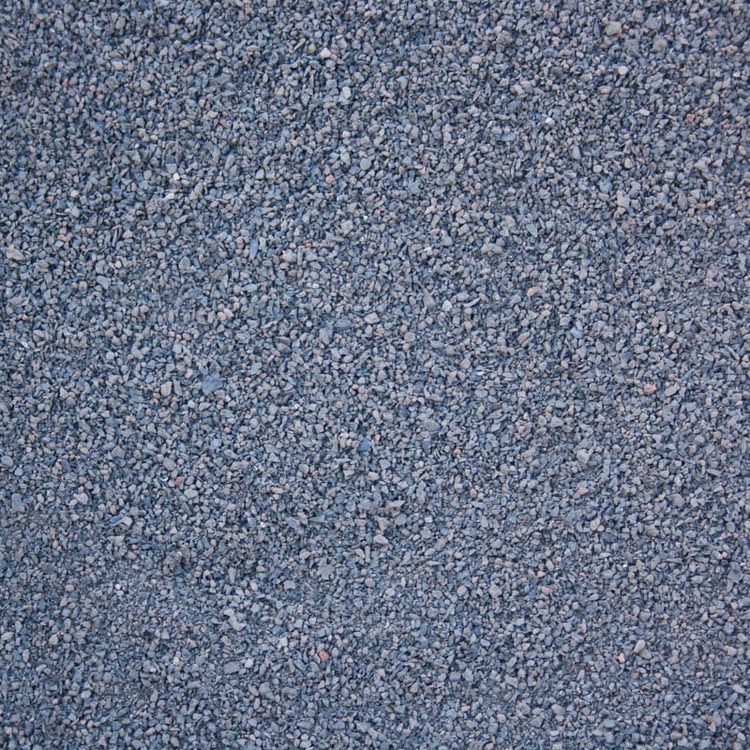 A close up of a pile of gravel on the ground