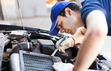 mechanic repairing car