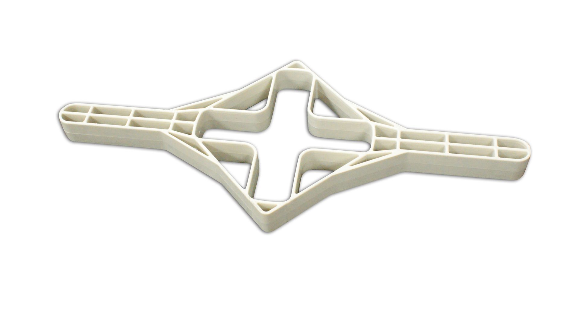 White plastic cross-shaped bracket with slotted arms on a plain background