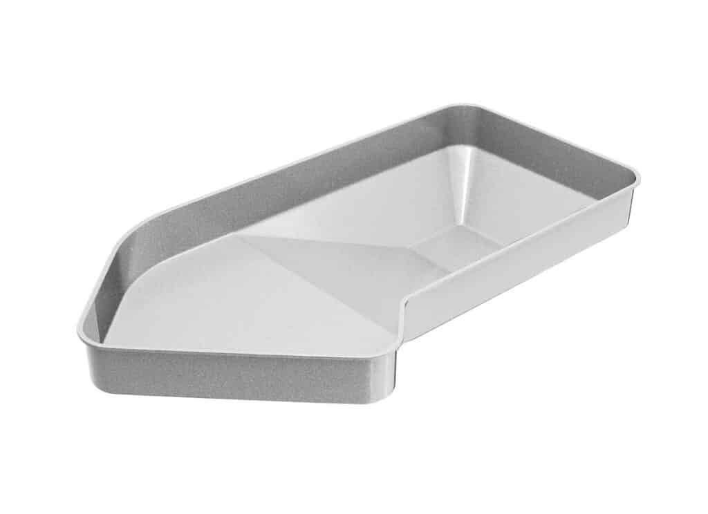 Gray metal baking pan with an irregular, geometric shape on a white background