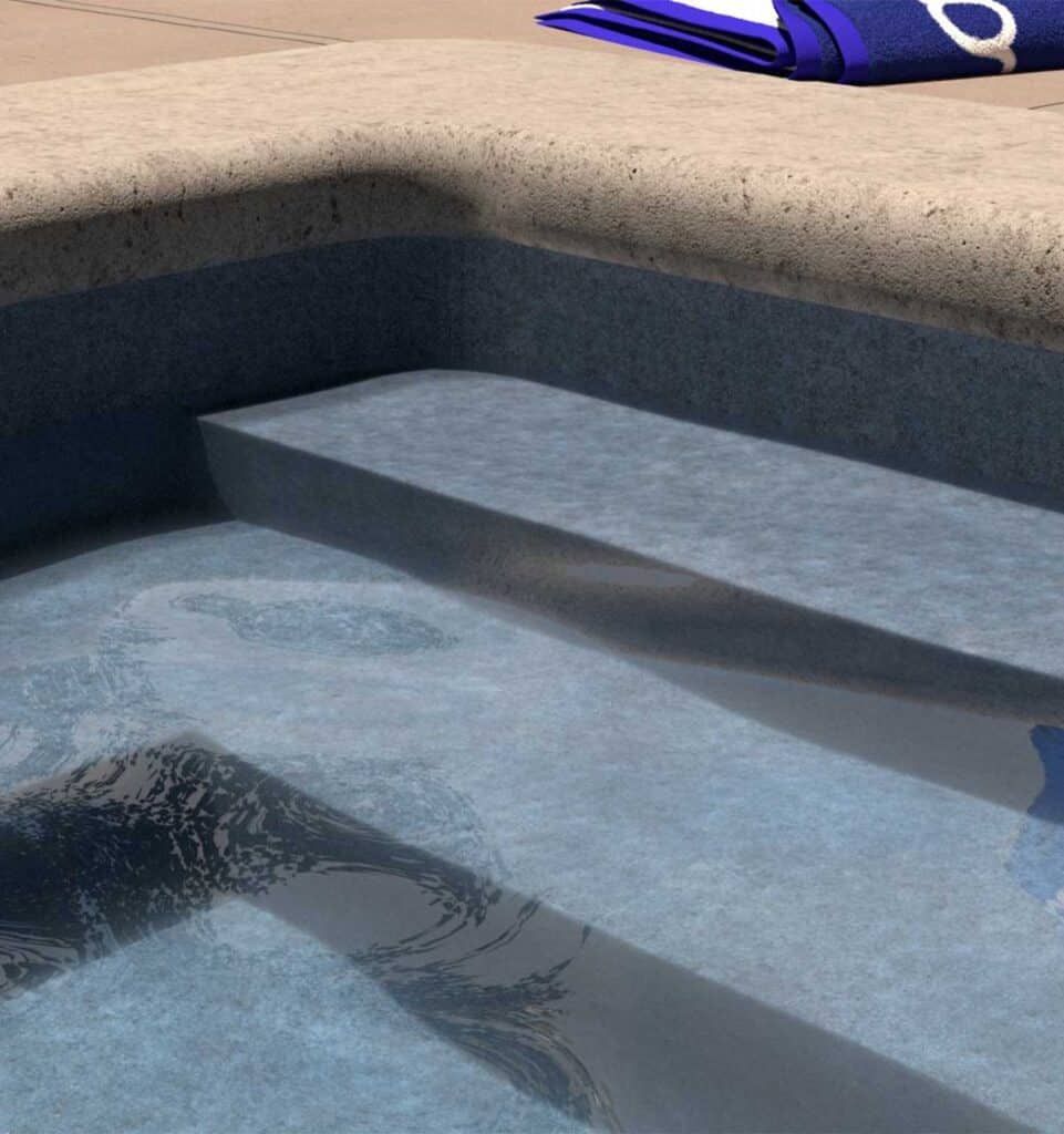Blue-tinted swimming pool steps with a submerged handrail and beige pool edge