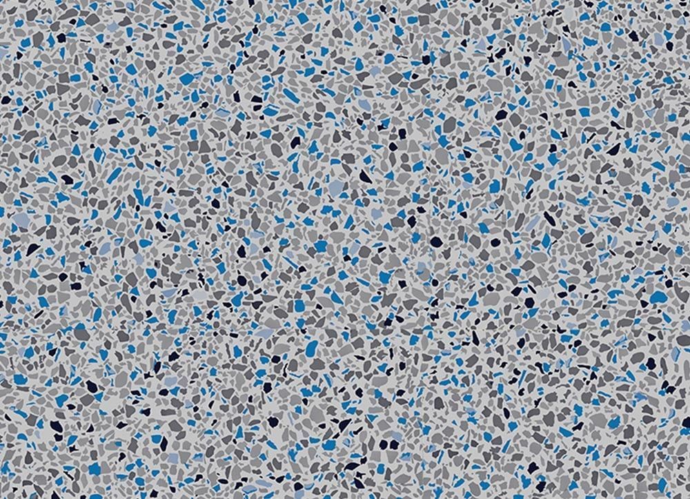 Gray speckled terrazzo-like pattern with scattered blue and black flecks