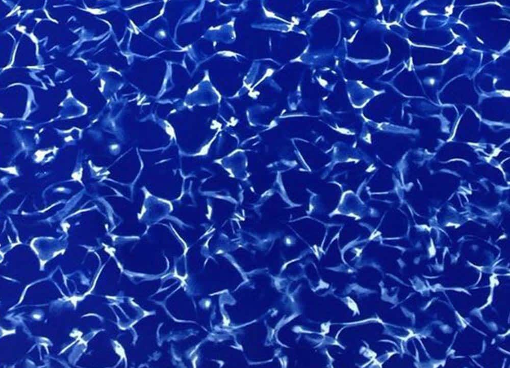 Blue abstract liquid texture with shimmering white highlights