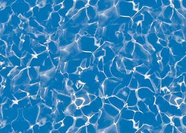 Blue pool water with sunlight reflections and rippling patterns