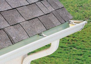 Roof gutter and downspouts