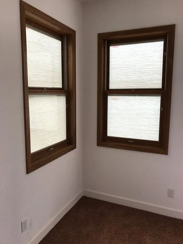 A room with two windows