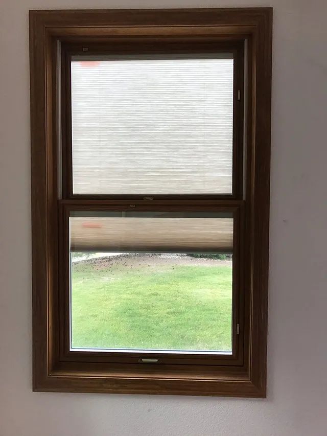 A window with a wooden frame