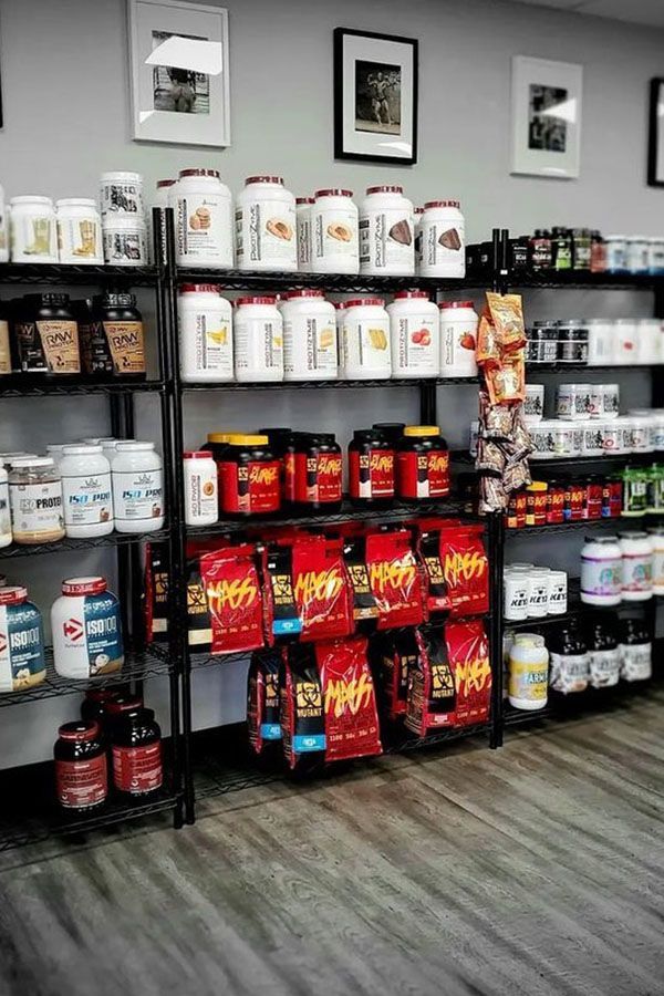 A store filled with lots of different types of protein powders.