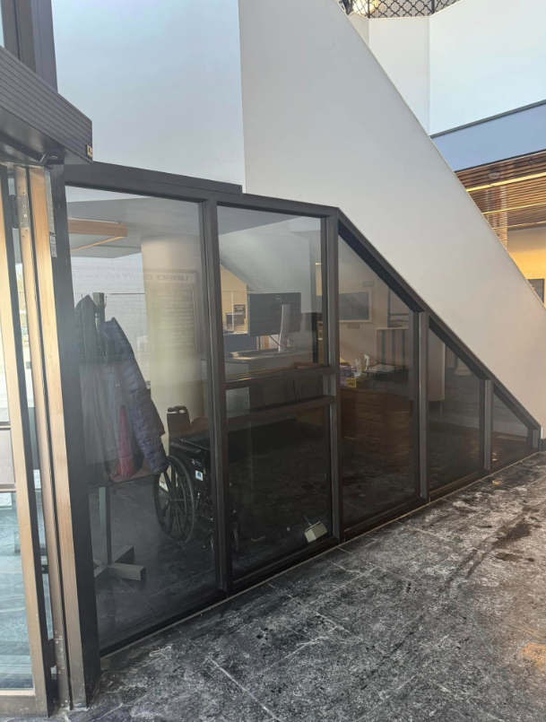 A building with a staircase and a glass wall