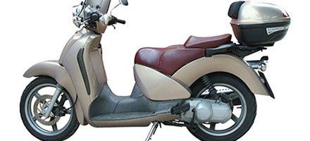 Tan colored moped