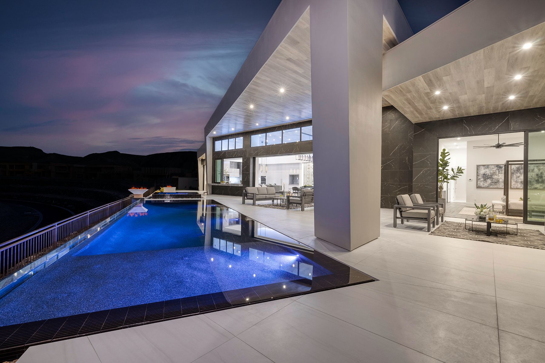 there is a large swimming pool in the middle of the house