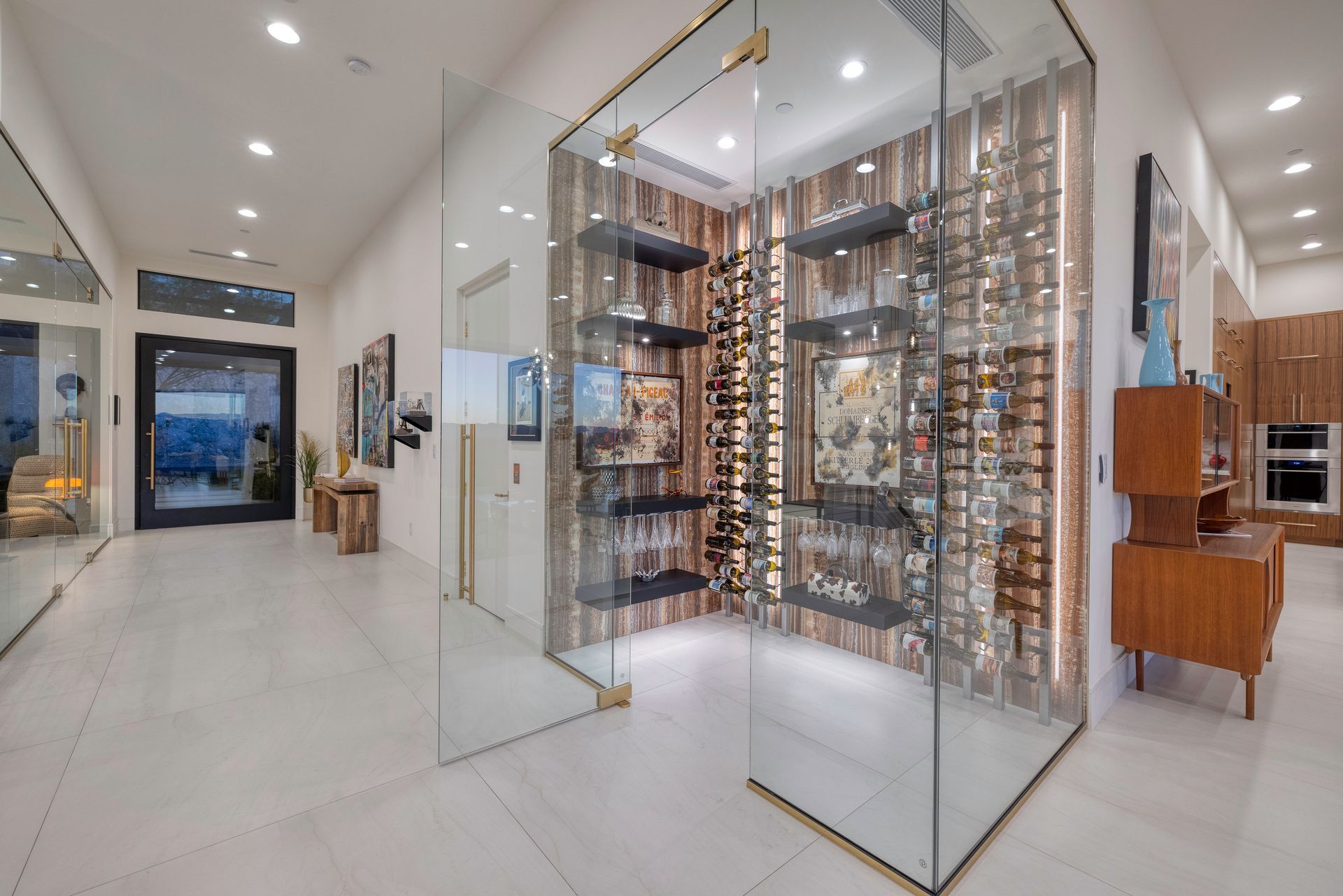 a glass case with shelves in a room