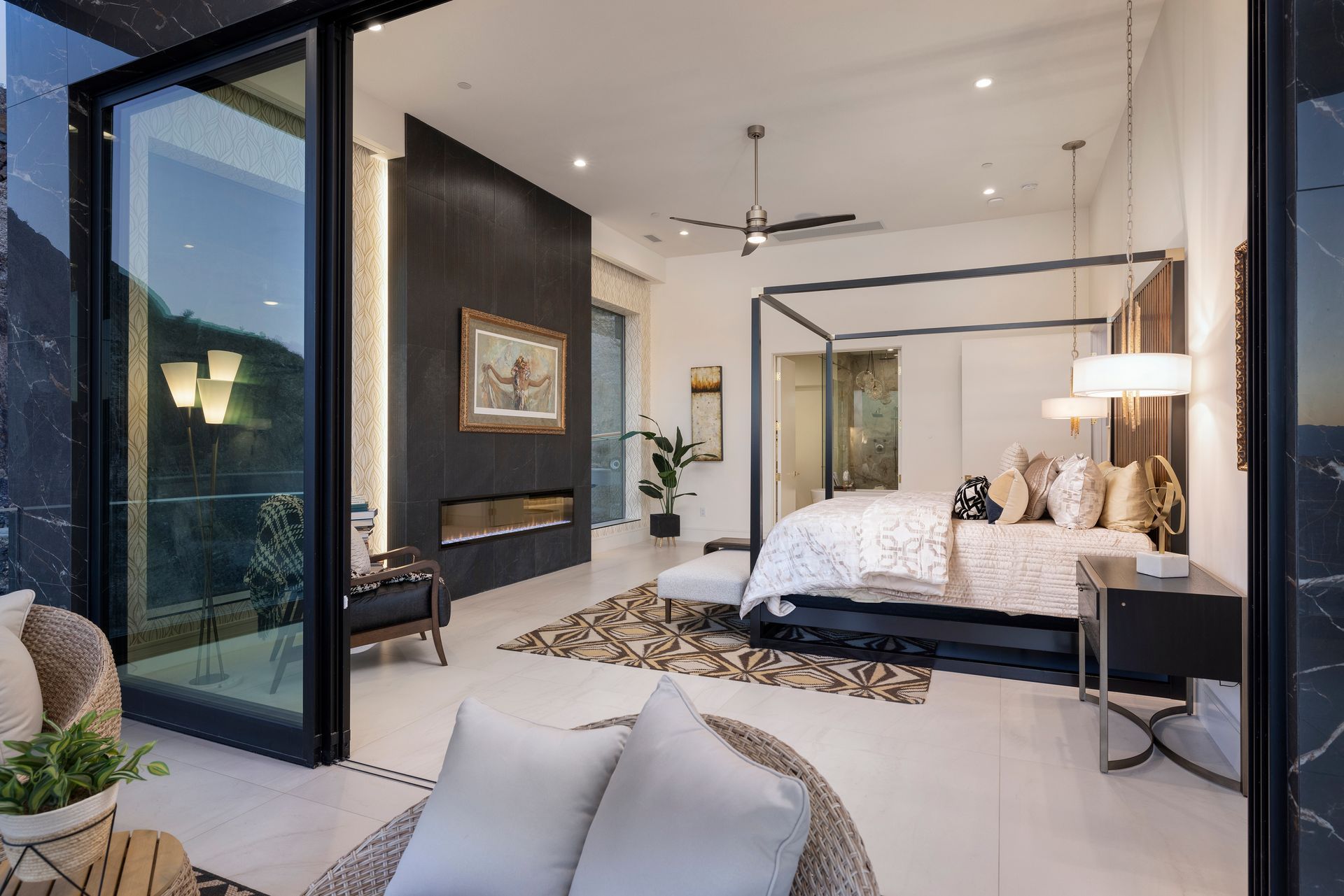 a bedroom with glass doors