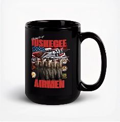 Black mug with a design honoring the Tuskegee Airmen, featuring a plane, flag, and soldiers.