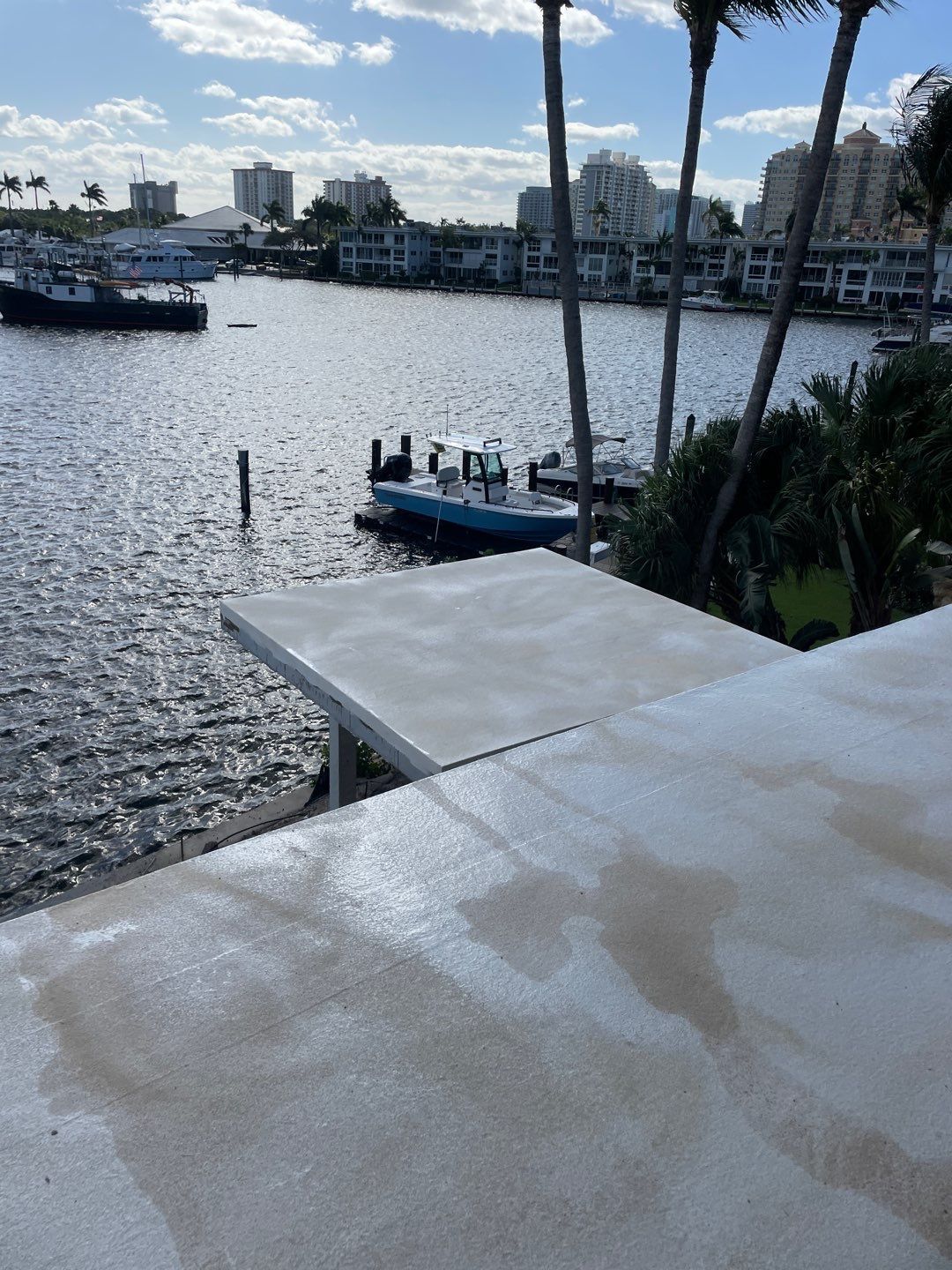 A view of a body of water with a dock in the foreground.