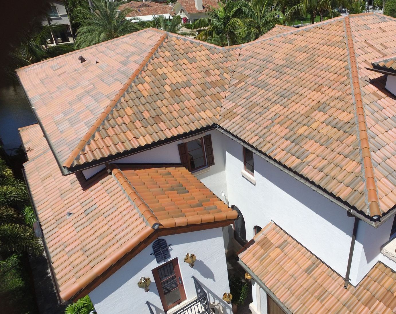 An aerial view of a house with a tiled roof
