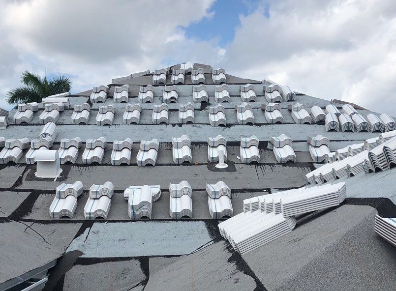 A pyramid made of bricks with a blue sky in the background