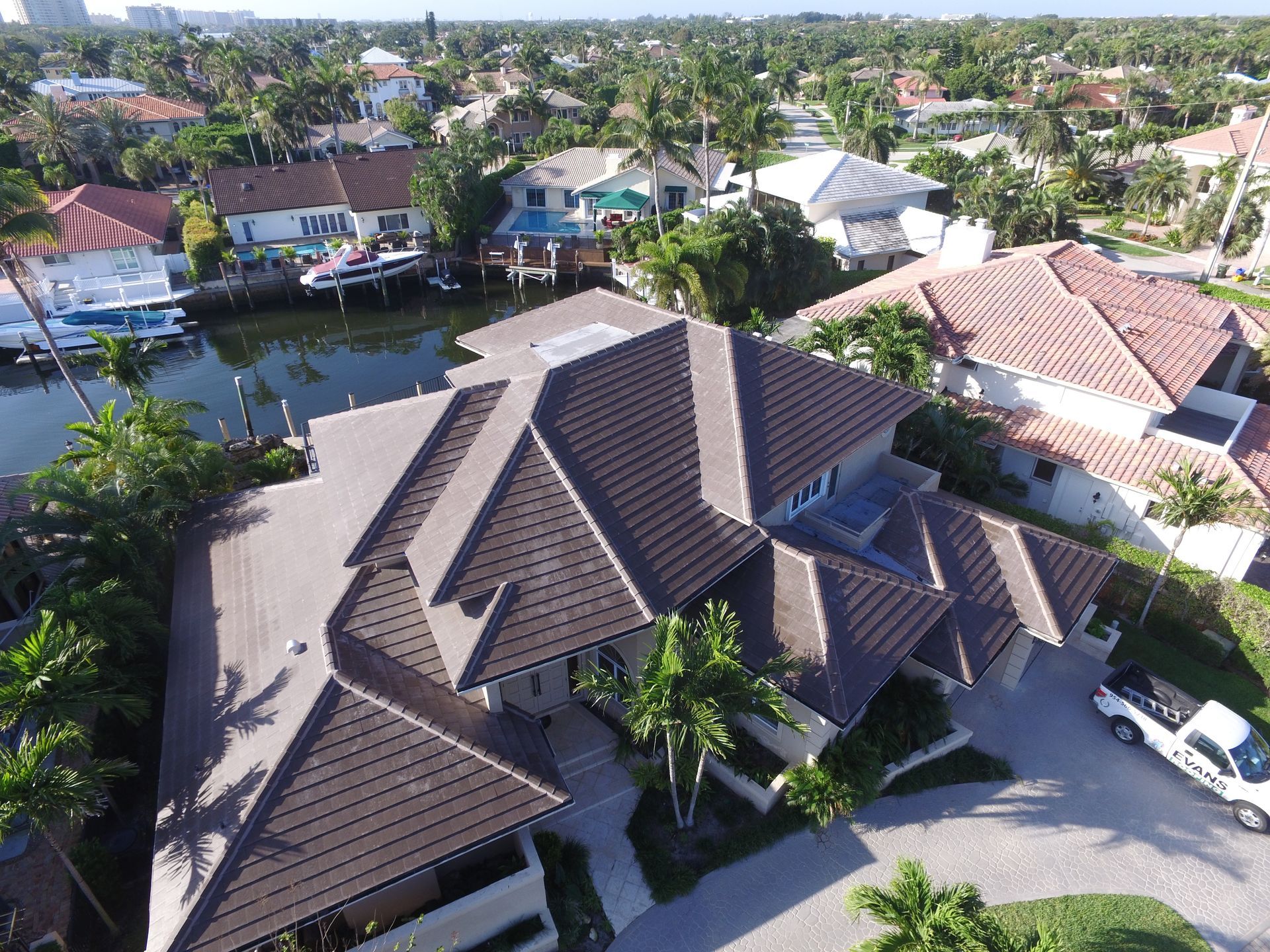 An aerial view of a large house in a residential area