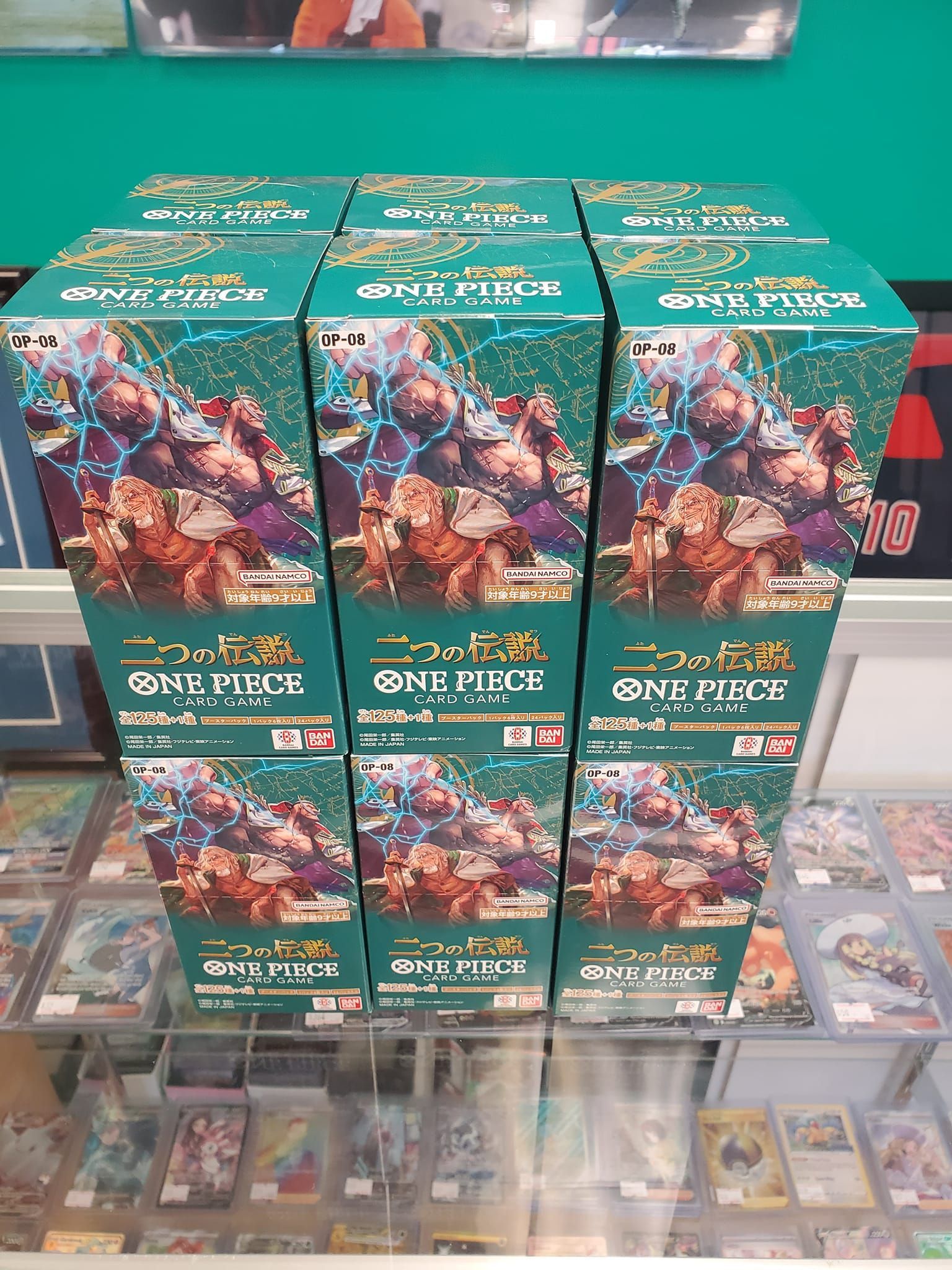 A bunch of boxes sitting on top of each other on a table.