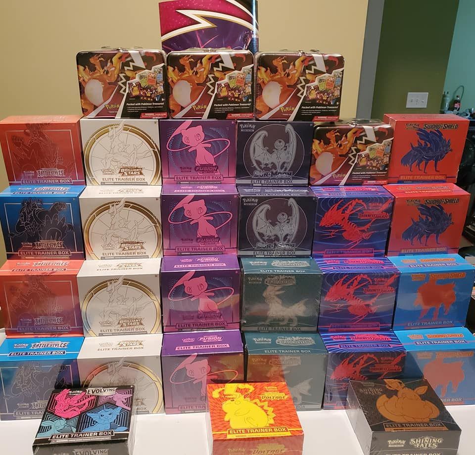 A bunch of boxes are stacked on top of each other on a table