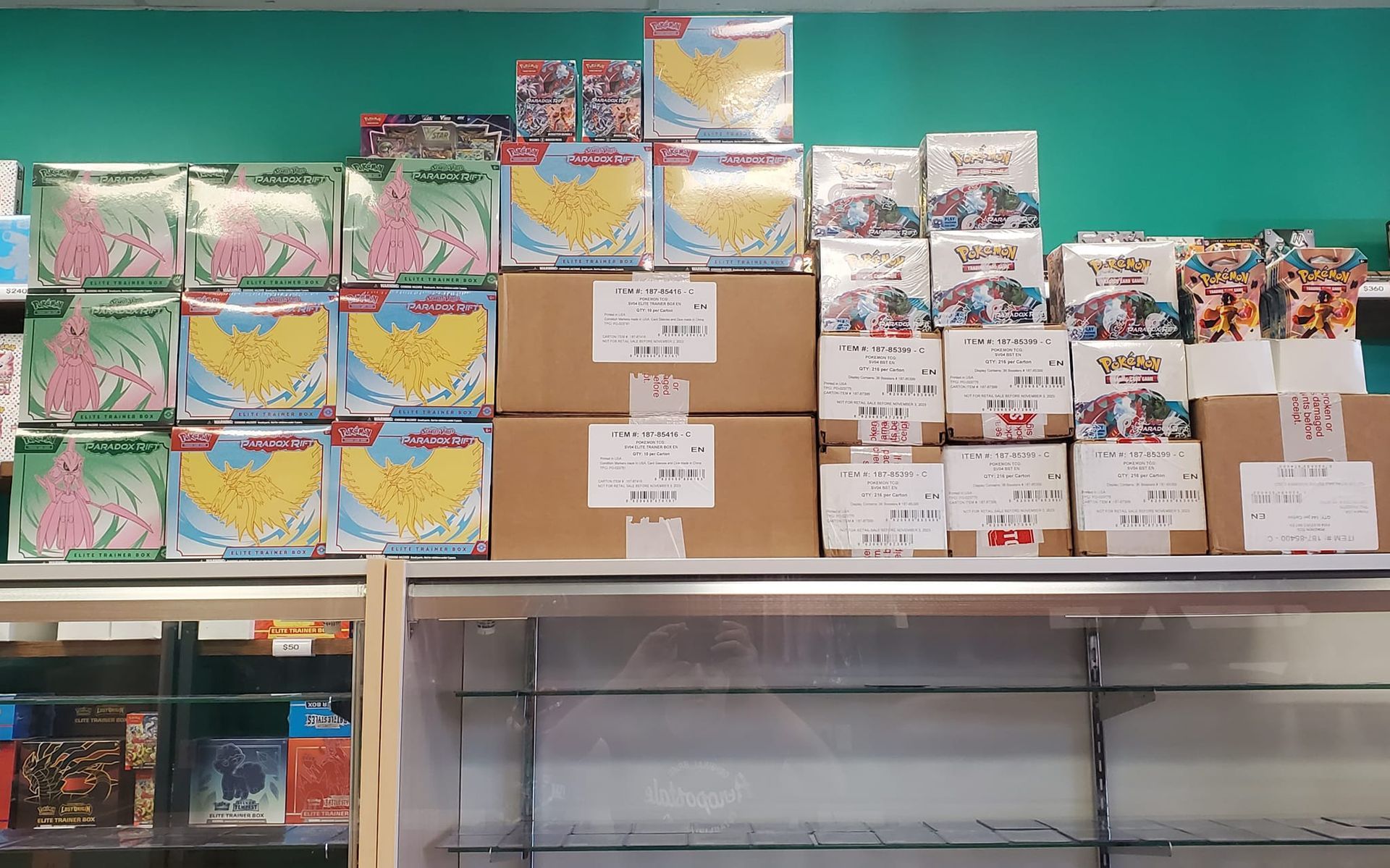 A bunch of boxes are stacked on top of each other in a store