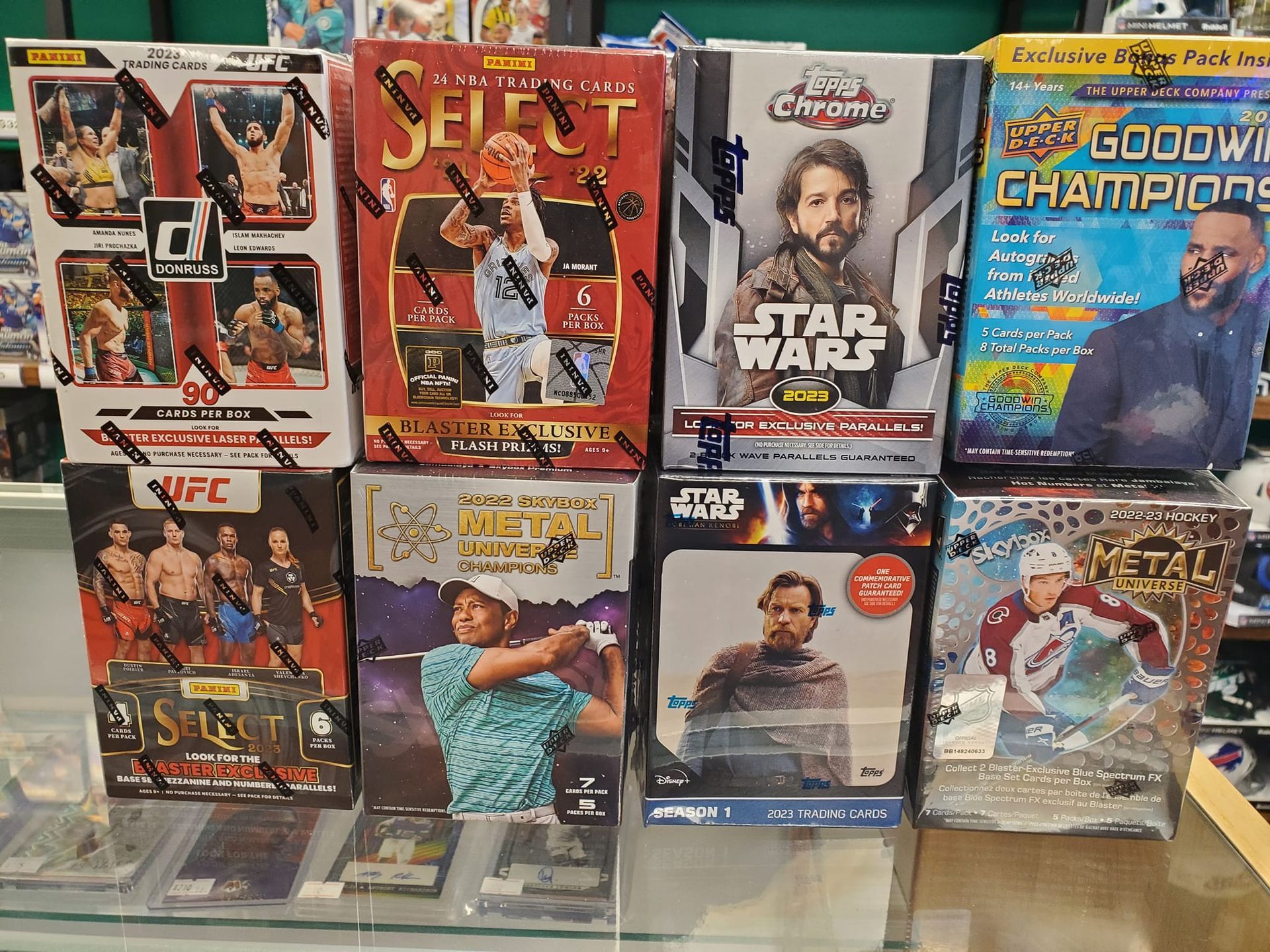 A bunch of cards are sitting on a shelf in a store.