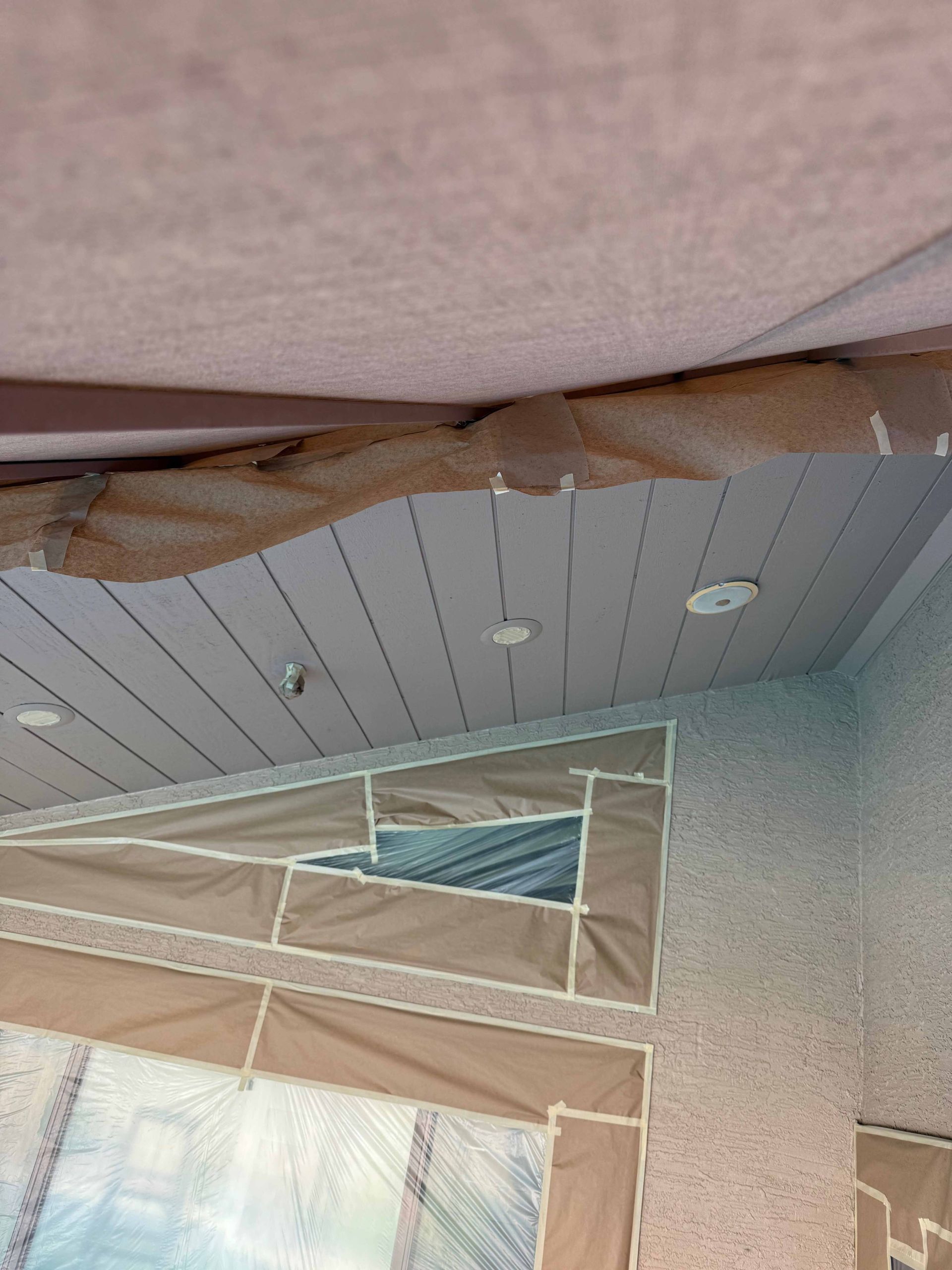 A room with a ceiling that is covered in plastic