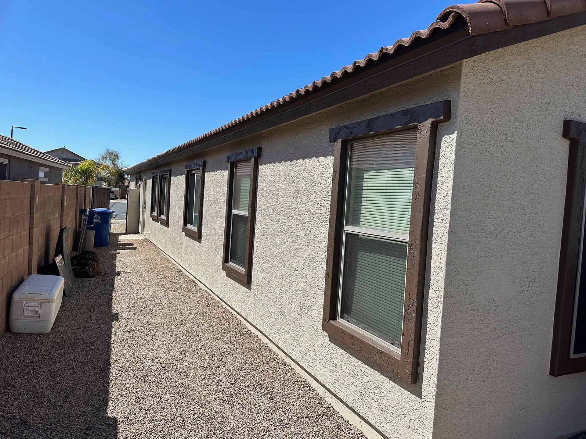 A house with a lot of windows on the side of it