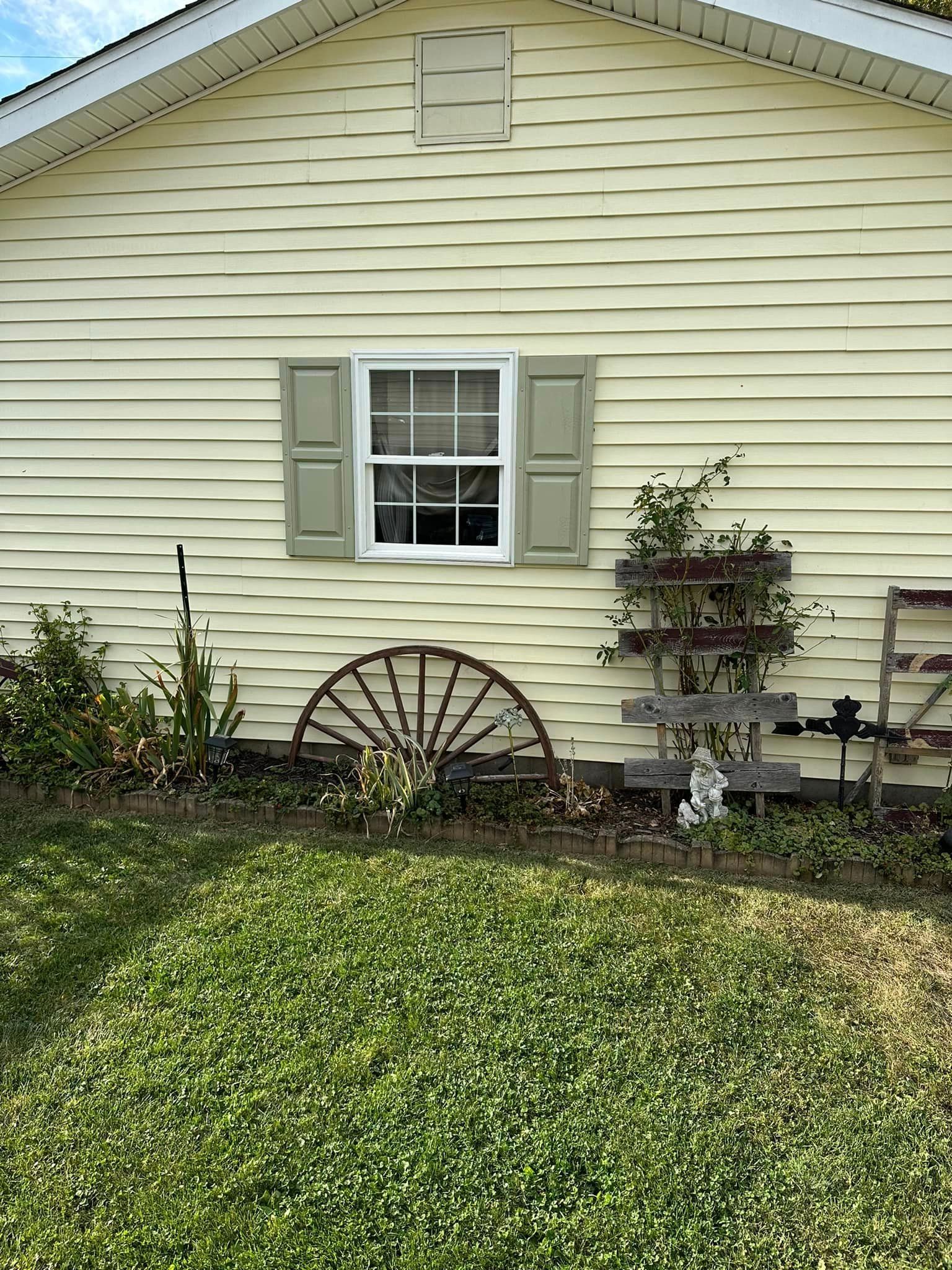A large room with hardwood floors and a counter in the middle of it.